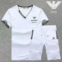 emporio Trainingsanzug mannche courte ea7 jogging noir et or fleurs col-v blanc